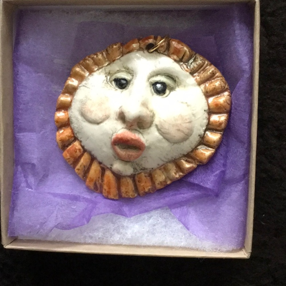 Artisan crafted “Sun” pendant